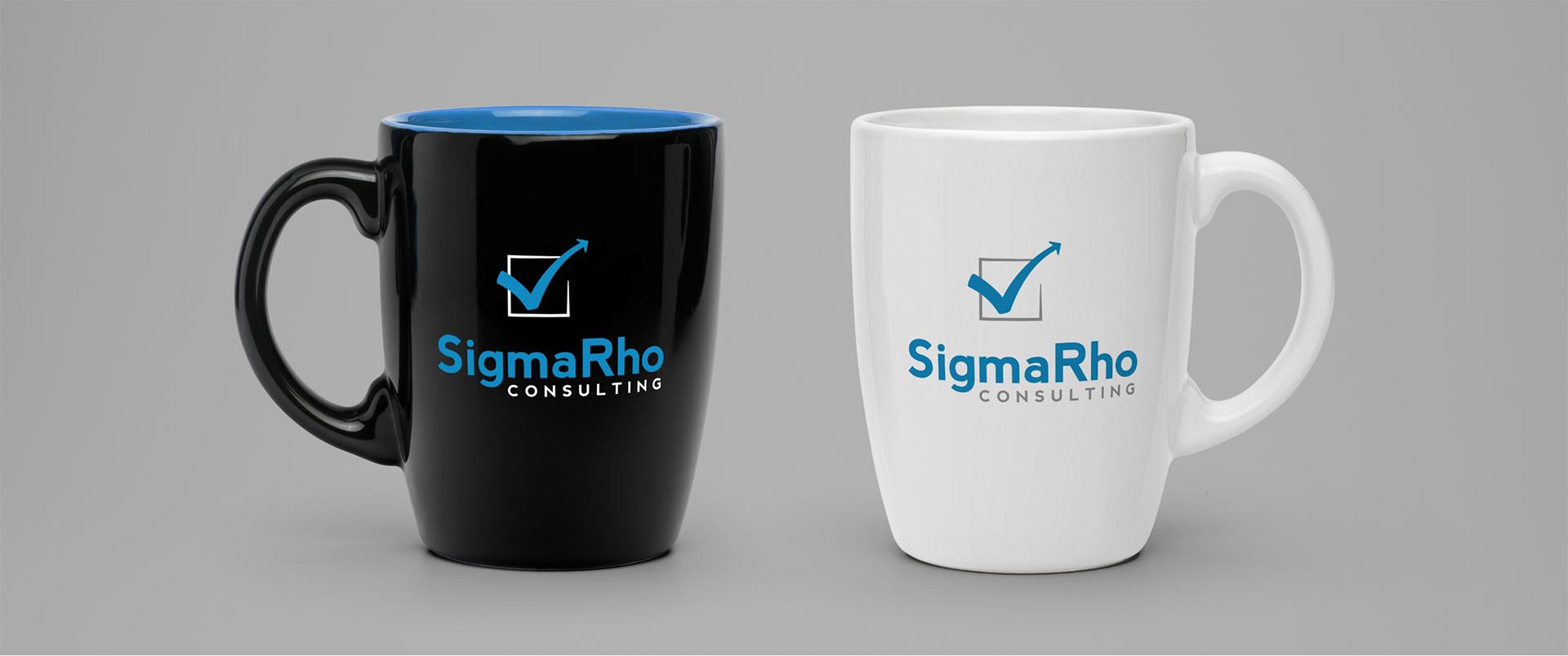 Sigma Rho logo on 2 coffee mugs