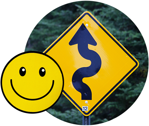 Yellow traffic sign and yellow smiley face